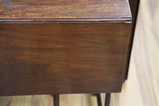 A George III mahogany drop leaf spider leg table, extended W.3ft